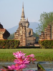 Wall Mural - Sitting Buddha at Wat Mahathat, the largest temple complex in the Historical Park of Sukhothai