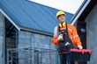 © visoot - Electrician working with tool at the construction site,House and house reconstruction.