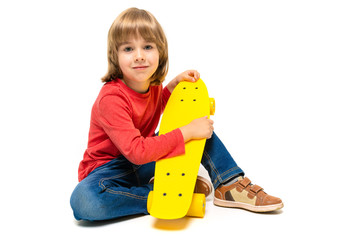 Sports teenager boy in red t-shirt and black jacket with yellow penny isolated on white background