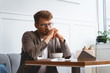 © Viacheslav Yakobchuk - Stylish young man spending time in cafe