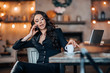 © Smith - beautiful businesswoman talking on the phone