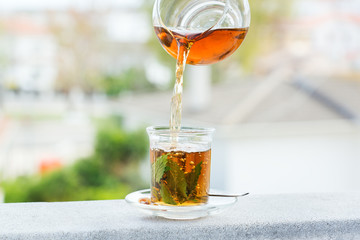 Sticker - Glass of hot mint tea, traditional moroccan moorish beverage