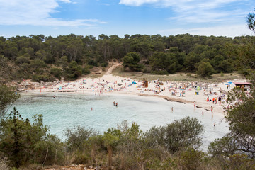 Wall Mural - Beach with people and sea landscape in Santanyi, Majorca