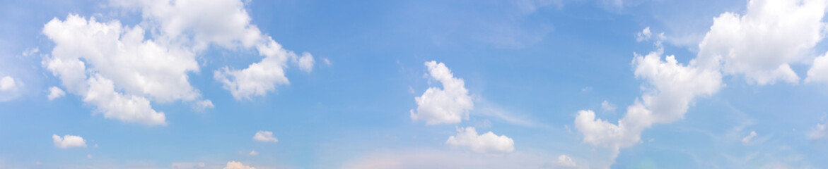 Wall Mural - panorama or panoramic photo of blue sky and white clouds or cloudscape.