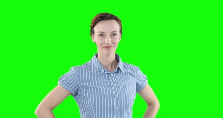 woman raising hand on green background