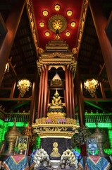 Wall Mural - Replica of the emerald buddha, exposed in the Haw Phra Yoke of Wat Phra Kaew in Ching Rai