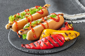 Sticker - Two hot dogs on stone board