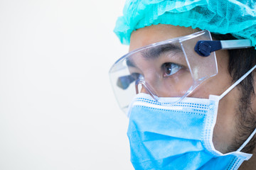 close up portrait  doctor with mask and headset ready for work in hospital.coronavirus concept.