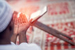 © FS-Stock - Religious black muslim man praying inside the mosque