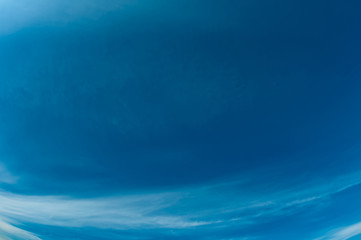 Natural sky composition. Sunny vast blue sky abstract background. Beautiful cloudscape, view over white fluffy clouds. Freedom concept, on the heaven. Element of design.