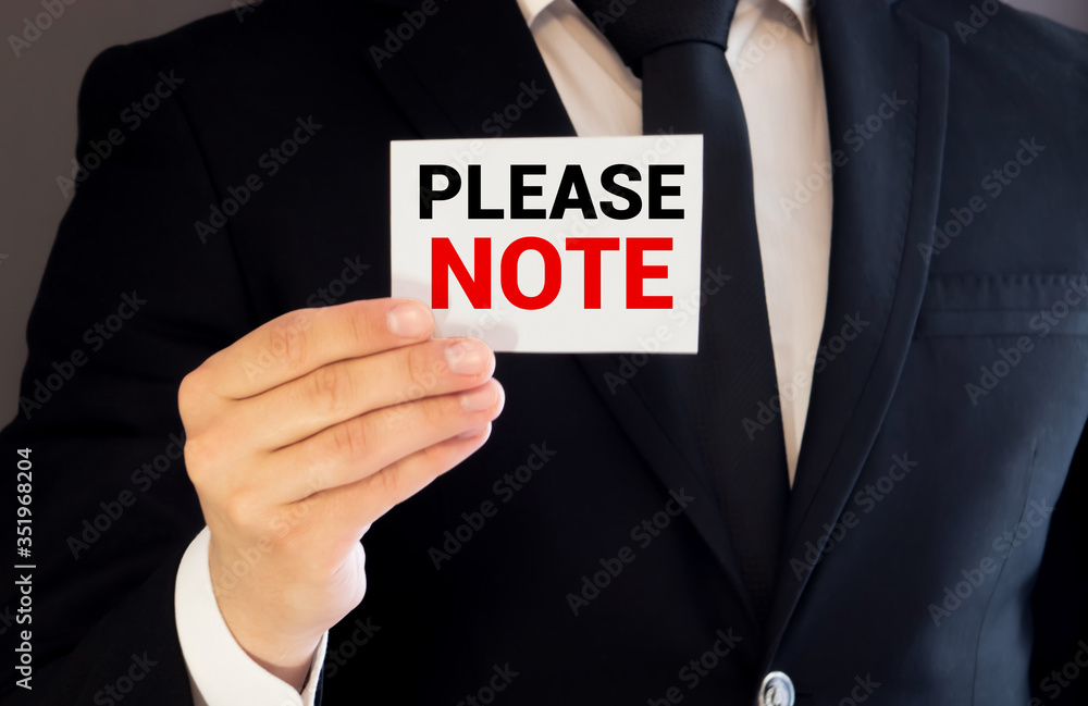Come To Note PLEASE NOTE, message on the card shown by a man, vintage tone Stock ...
