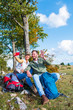 © FS-Stock - Cheerful young couple taking a selfie outdoor during the travel in the mountains