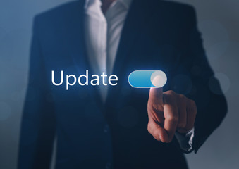 Businessman switch on Update button.