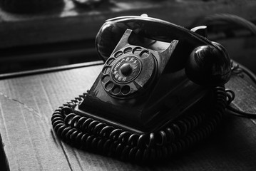 vintage black old telephone handset on black background