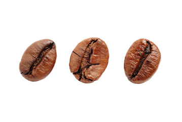 Three roasted coffee beans, isolated on a white background