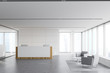 © ImageFlow - Reception in white office with lounge