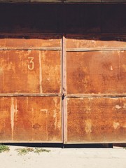 Wall Mural - Old rusty metal garage outdoor