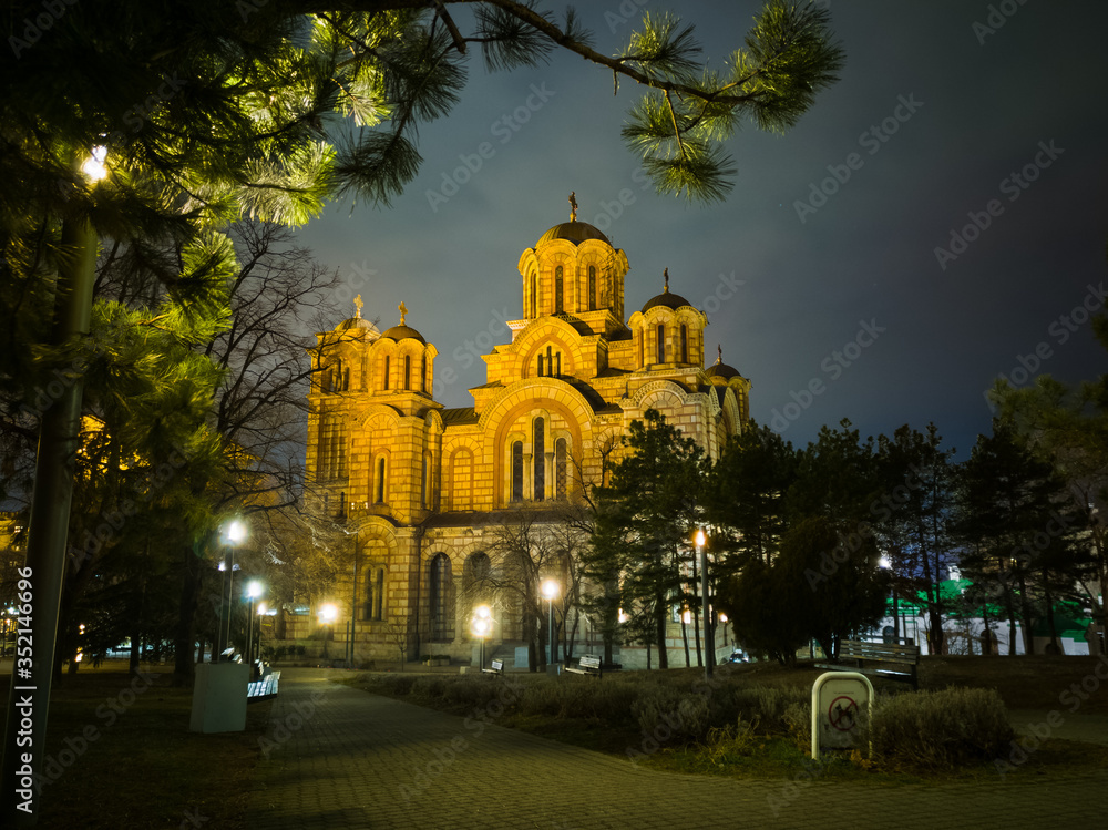 Exterior of the Saint Mark's Church (Crkva Svetog Marka), a Serbian Orthodox church located in the Tasmajdan park, built in 1940 in the Serbo-Byzantine style, at night. - obrazy, fototapety, plakaty 