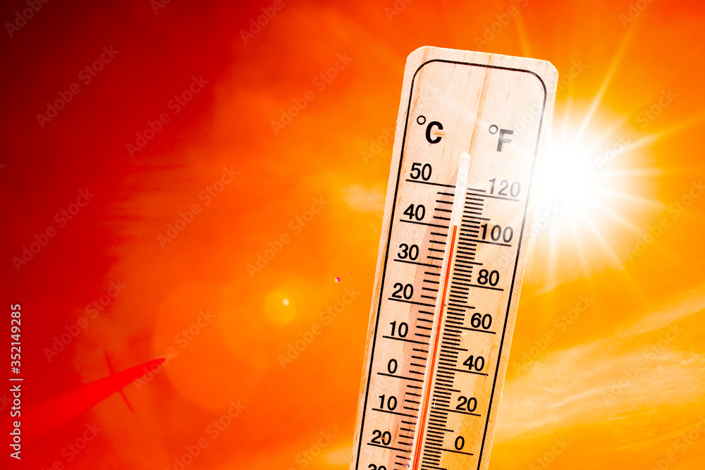 Orange sky with bright sun and thermometer symbolizing climate change and global warming - obrazy, fototapety, plakaty 