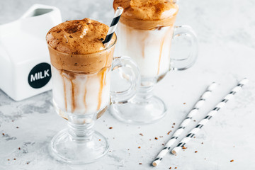 Canvas Print - Dalgona coffee. Iced coffee with creamy whipped foam and almond milk.