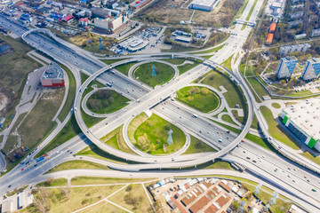 Wall Mural - Top view of the multi-level road junction in Moscow from above, car traffic and many cars, the concept of transportation. road junction at the intersection of the Kashirskoe highway and ring road