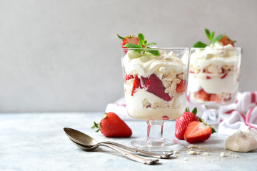 Eton mess - traditional english dessert with meringue, whipped cream and fresh berries.