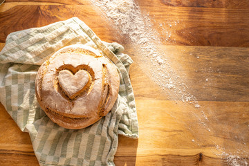 freshly baked bread with heart and love