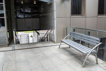 Poster - Modern bench in a granite hall in an office building. 24 May 2020. Minsk. Belarus