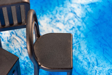 View of chairs on a light blue background