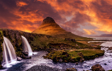  Incredible Nature landscape of Iceland. Fantastic picturesque sunset over Majestic Kirkjufell mountain and waterfalls. Church mountain, Iceland. Iceland the most beautiful and best travel place.