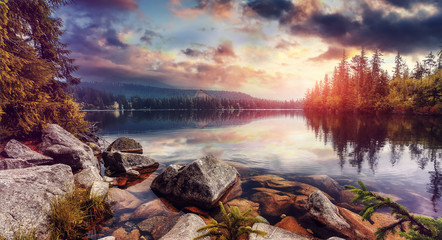 Aufkleber - Amazing lake Strbske Pleso during Sunrise. Creative image. Wonderful Autumn landscape. Picturesque view of nature. Amazing natural Background. Popular Travel Destinations. High Tatras. Slovakia
