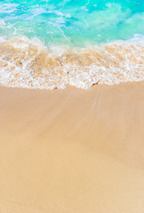 Wave on sandy beach. Panoramic background with copy space. 