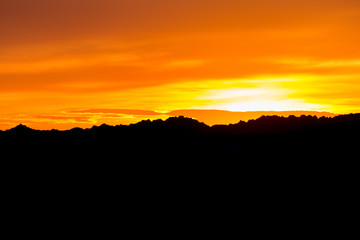 Wall Mural - landscape view of a colorful sunset in badlands national park in south dakota).