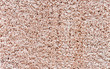 © Valemaxxx - Beige carpet with a long and soft pile. Background with carpet pile.