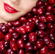 © Svetlana Fedoseeva - Beautiful woman with red berries. Woman with a sweet cherry. Juicy cherries.