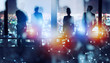 © alphaspirit - Group of business partner looking for the future with network digital effect
