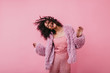 © Look! - Incendiary fantastically beautiful girl in coat of eco fur moves fun. Picture of lovely lady in pink clothes