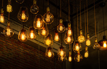 House Interior Of Loft And Rustic Style. Beautiful Vintage Luxury Light Bulb Hanging Decor Glowing In Dark. Retro Filter Effect Style. Blend Of History And Modern.