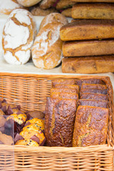 Freshly baked traditional loaves of rye bread on stall