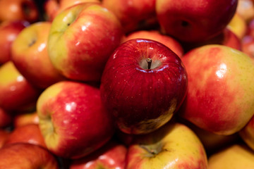 Apples background. Beautiful red fruits. Healthy foods for immunity.