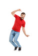 © Pixel-Shot - Handsome young man dancing against white background