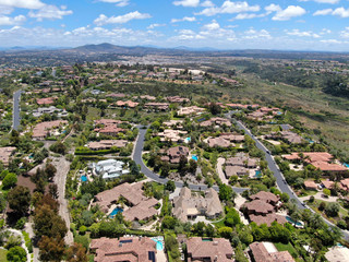 Wall Mural - Aerial view of high class neighborhood with big residential mansions with swimming pool in the green valley, Pacific Highlands Ranch, San Diego, California, USA.