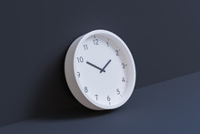 3d Rendering - White Wall Clock Leaning Against Dark Gray Wall. Hour Hand Pointing At 2 And Minute Hand Pointing At 10.