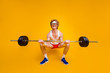 Full length body size view of nice funky motivated weak guy lifting barbell doing work out coacher trainer program regime body building isolated over bright vivid shine vibrant yellow color background