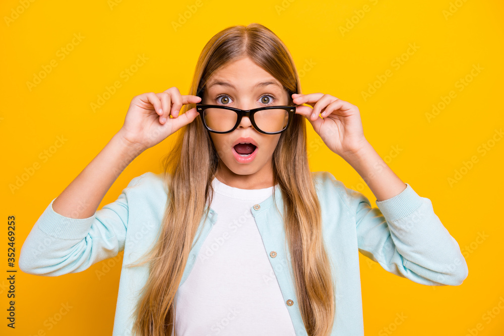 Photo of beautiful pretty little blond lady diligent student pupil take off glasses open mouth see bad grade mark year wear specs casual shirt isolated yellow bright color background - obrazy, fototapety, plakaty 
