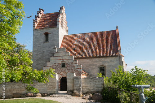 Cuadros en Lienzo old danish church on stevns in denmark almost falling into the ocean