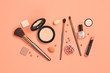 Beauty cosmetic makeup luxury set. Fashion woman make up product, brushes, lipstick, nail polish, coral collection. Creative concept. Cosmetology make-up accessories, top view.
