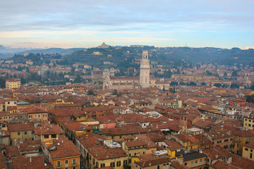 interesting view of verona from above with the bell towers and houses in the background
