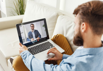 Man speaking with online financial counselor.