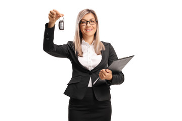 Poster - Young professional woman showing a car key